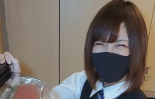 At the prize counter of a pachinko parlor she has a cute smile